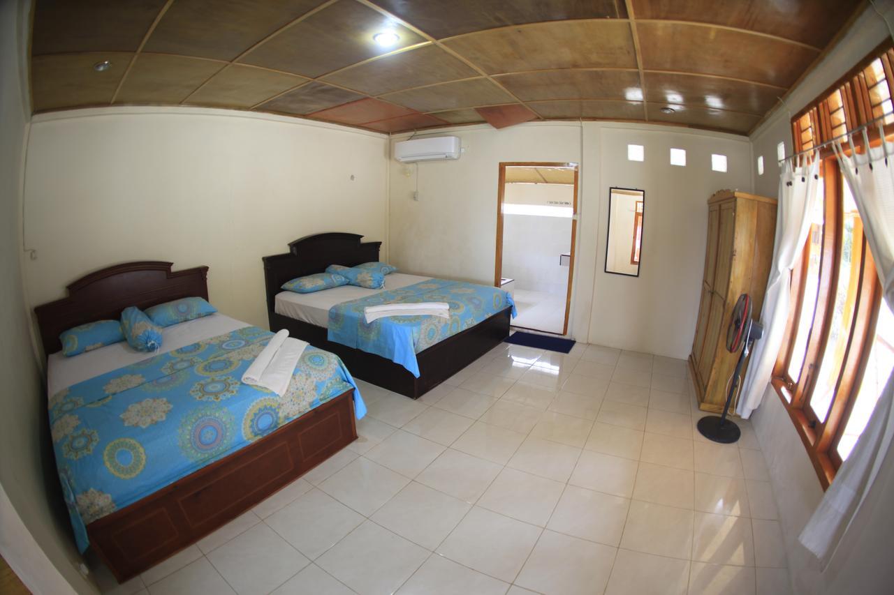 Puri Asu Resort Palau Asu Esterno foto